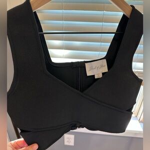 Black ribbed-feel cropped tank with cut-outs